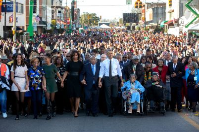The_First_Family_joined_others_in_beginning_the_walk_across_the_Edmund_Pettus_Bridge_2015.jpg
